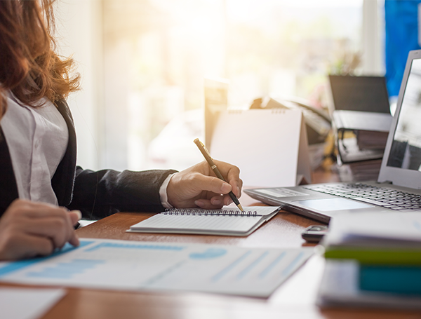 A bookkeeper working to maintain books